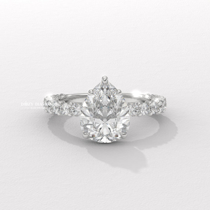 Angled view of pear cut diamond in solitaire setting