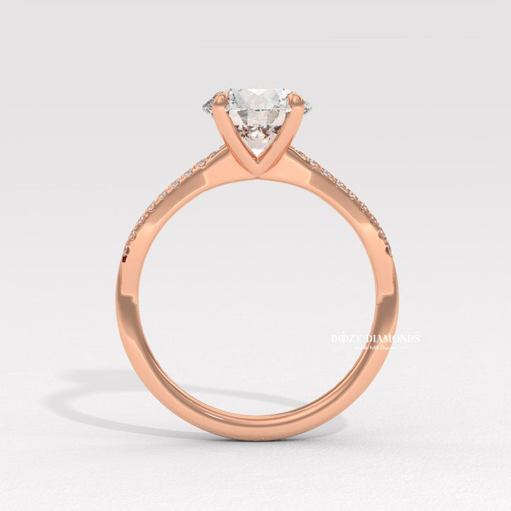 Lifestyle shot of round solitaire diamond ring on hand