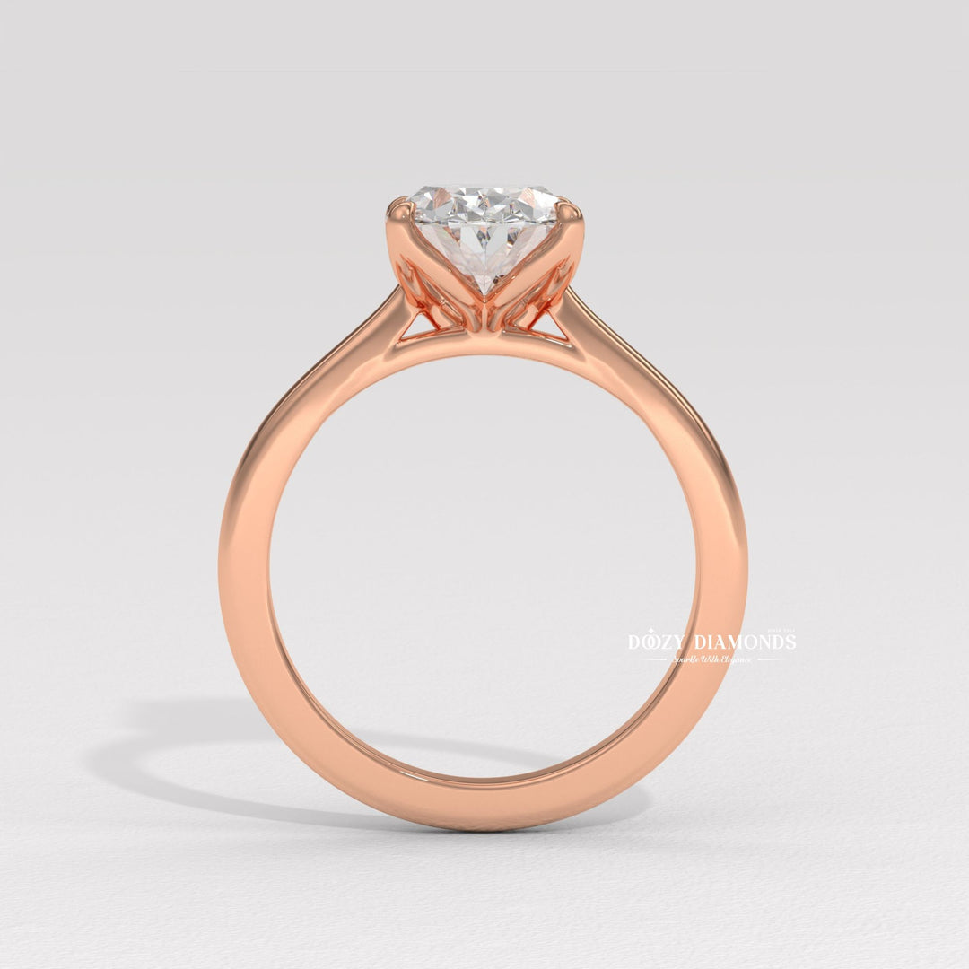 Fine craftsmanship detail on oval solitaire engagement ring