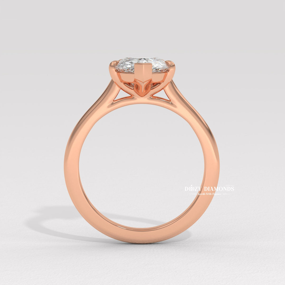 Pear solitaire engagement ring with brilliant diamond sparkle
