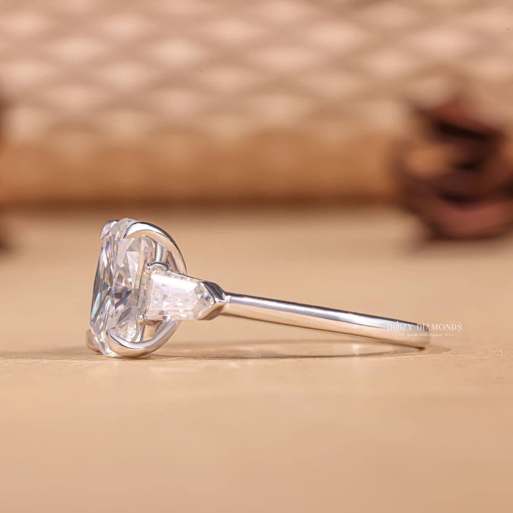 Close-up of cushion cut center diamond in three stone engagement ring