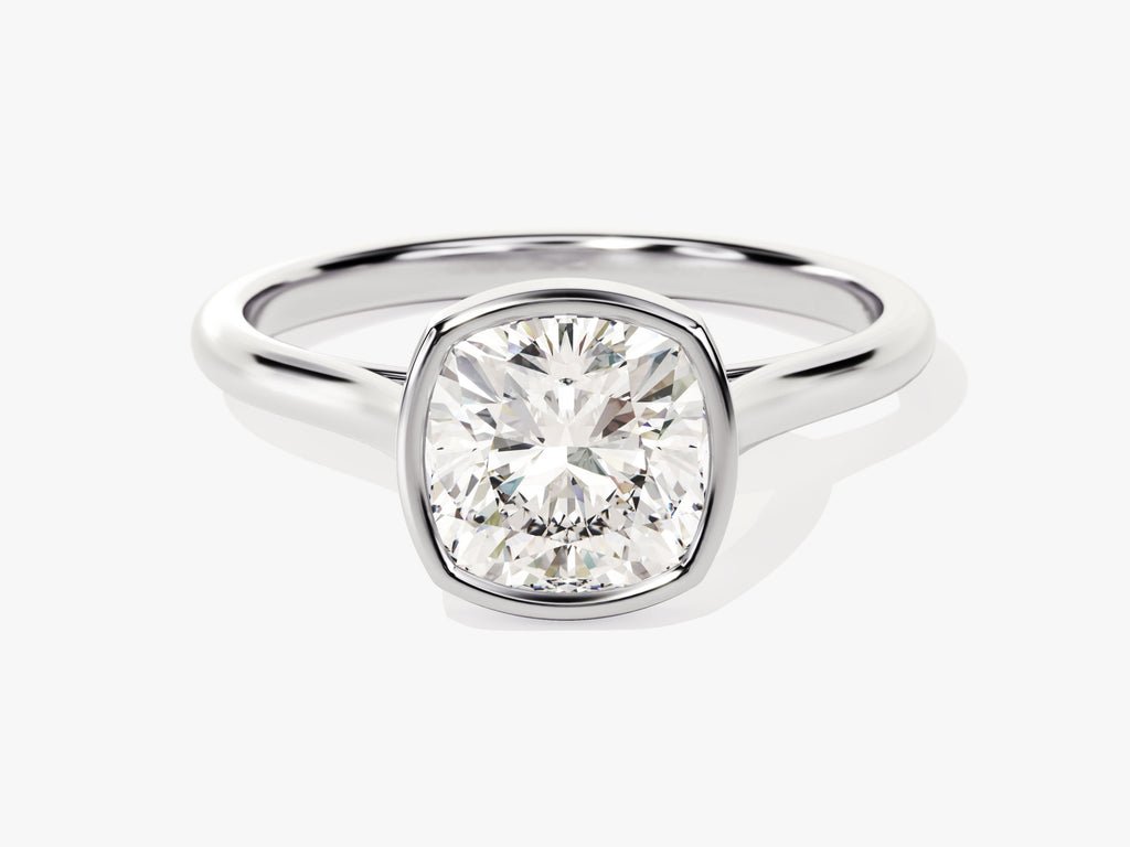 Angled view of cushion cut diamond in bezel setting