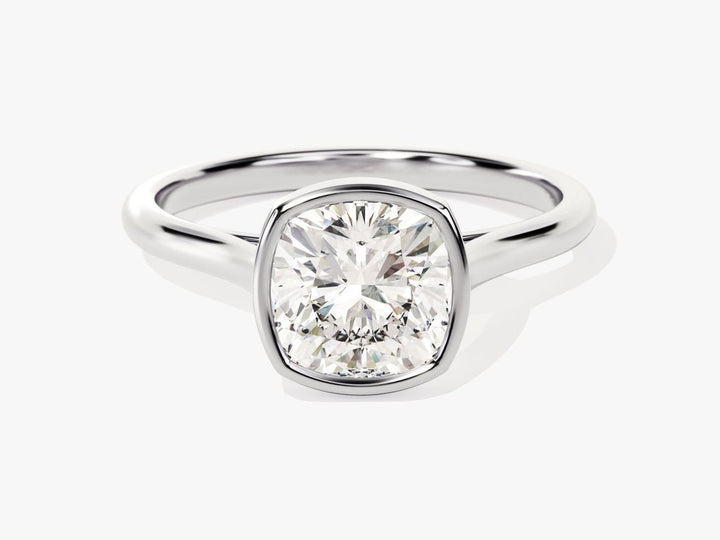 Angled view of cushion cut diamond in bezel setting