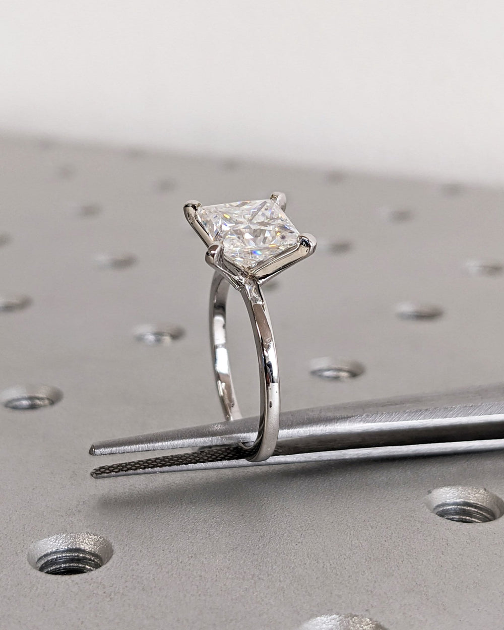 Princess solitaire lab grown diamond ring side profile in gold setting