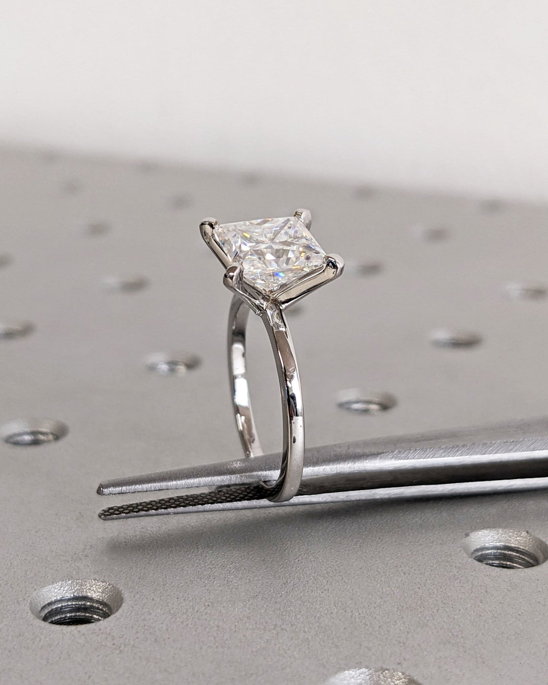 Princess solitaire lab grown diamond ring side profile in gold setting