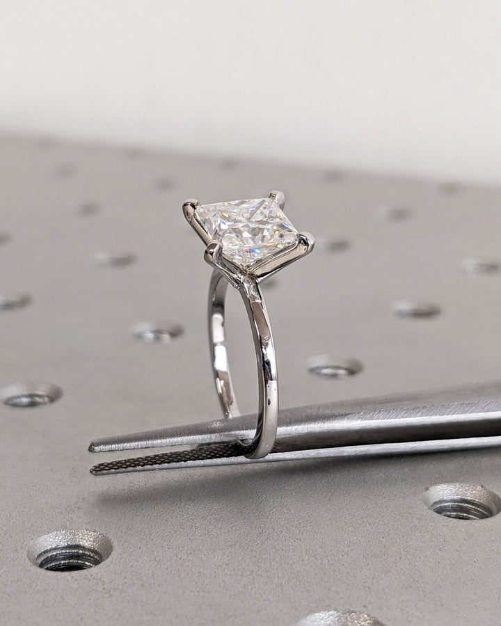 Princess solitaire lab grown diamond ring side profile in gold setting