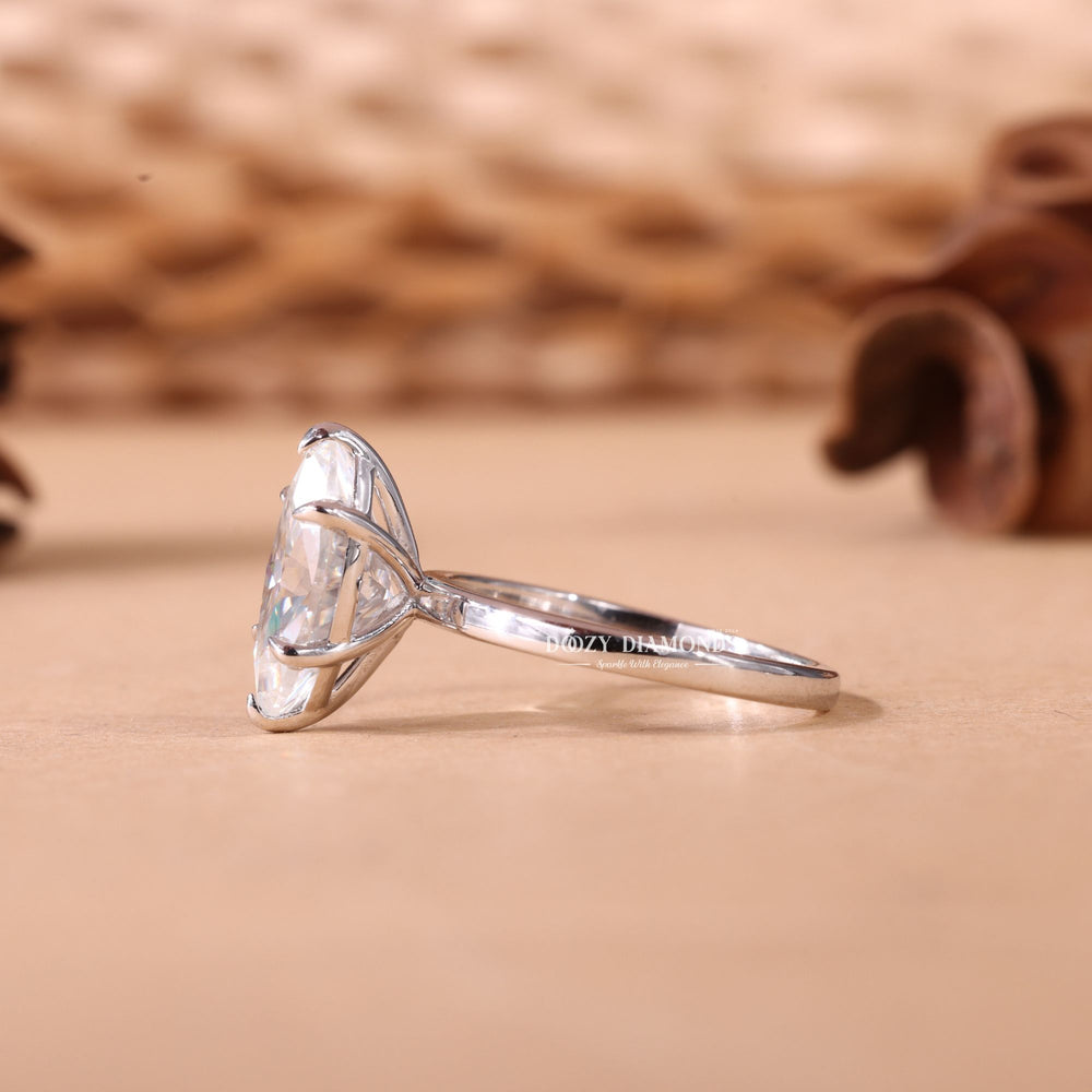 Marquise cut solitaire engagement ring with IGI certified center diamond