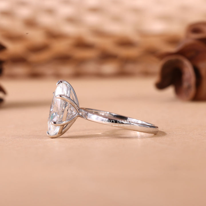 Marquise cut solitaire engagement ring with IGI certified center diamond