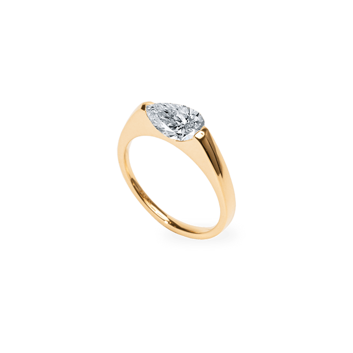 Pear solitaire engagement ring offered in gold and platinum
