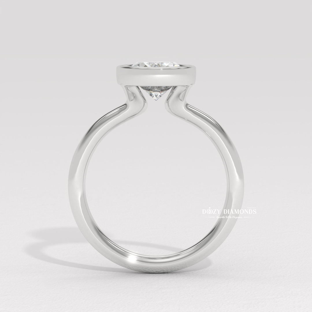 Fine craftsmanship detail on oval bezel engagement ring
