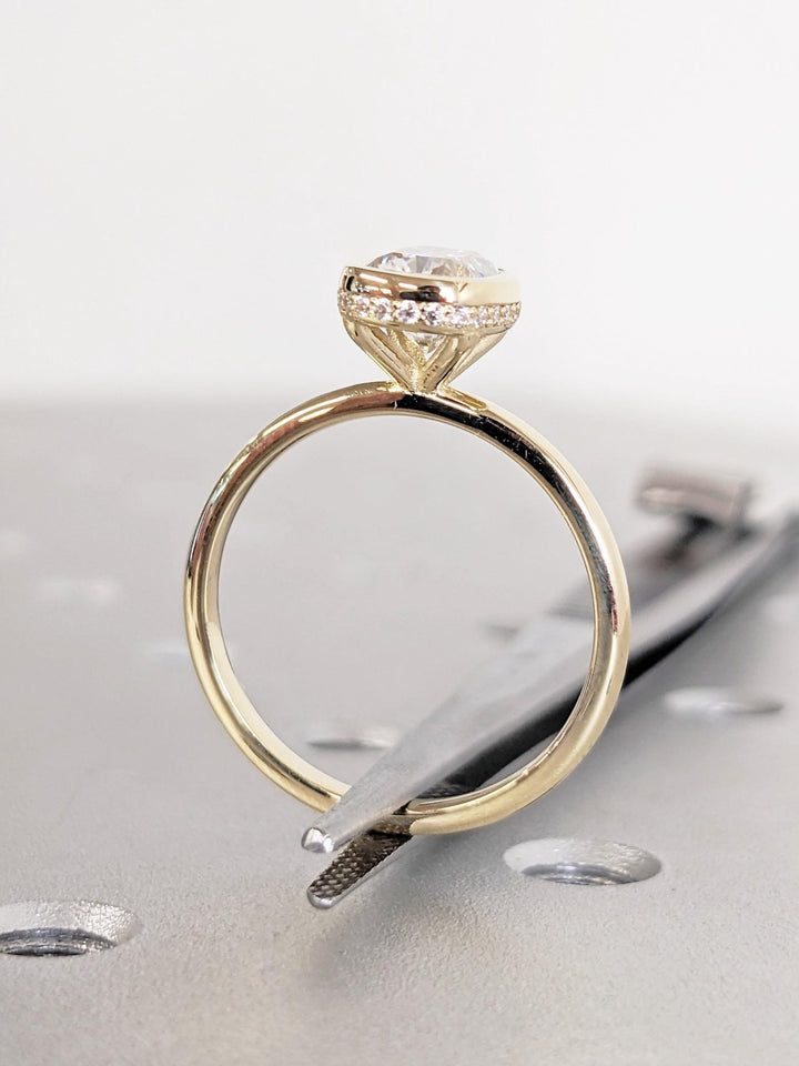 Cushion hidden halo lab grown diamond ring side profile in gold setting
