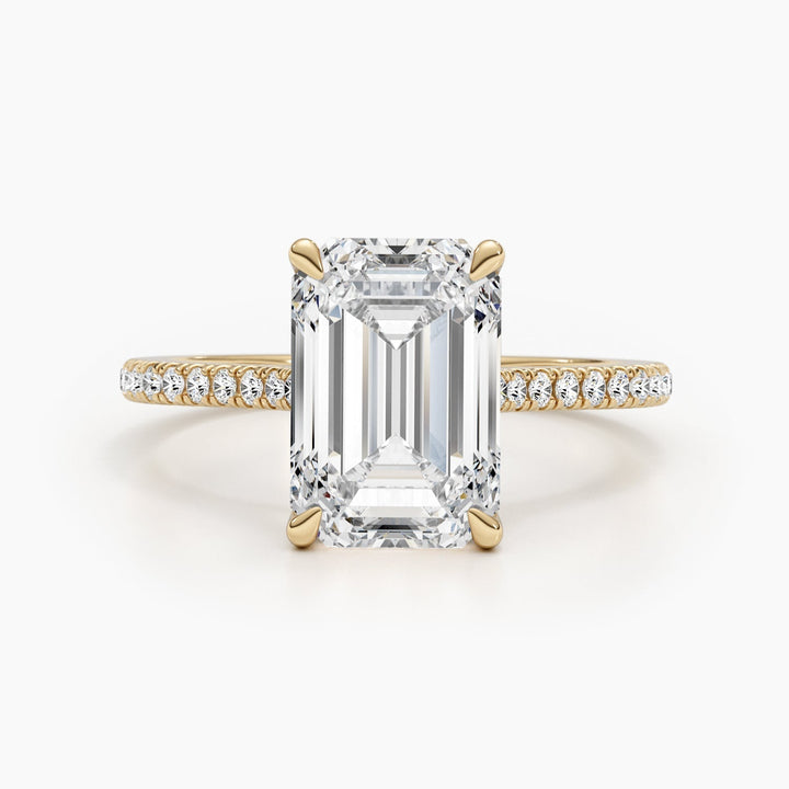 Emerald pave engagement ring finished in polished solid gold