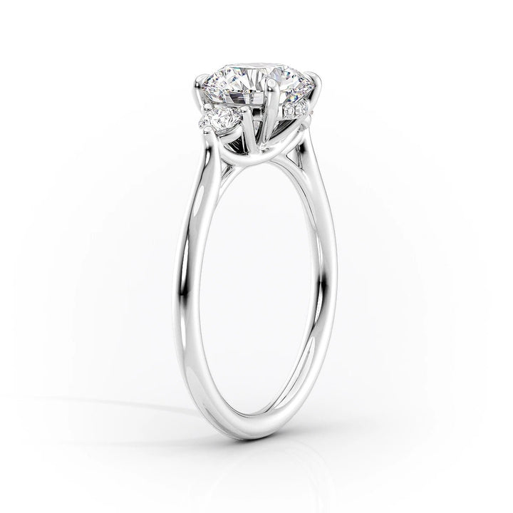 Certified oval cut diamond featured in three stone engagement ring