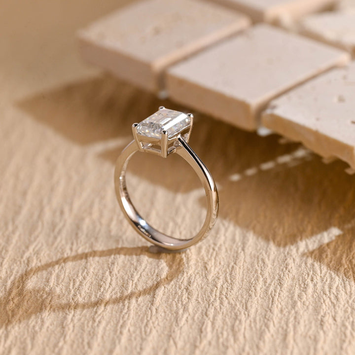 Emerald solitaire engagement ring with IGI certificate and packaging