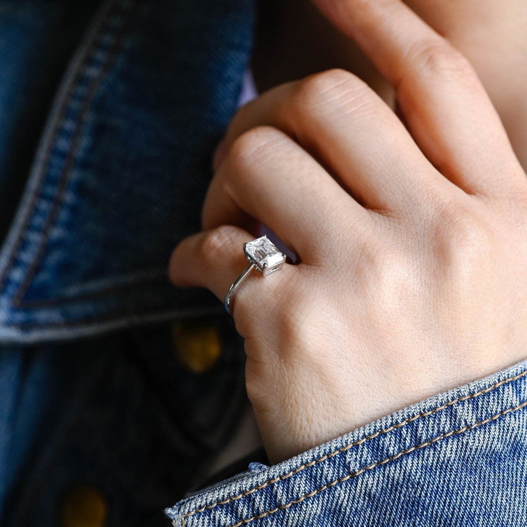 Classic emerald solitaire engagement ring crafted for everyday wear
