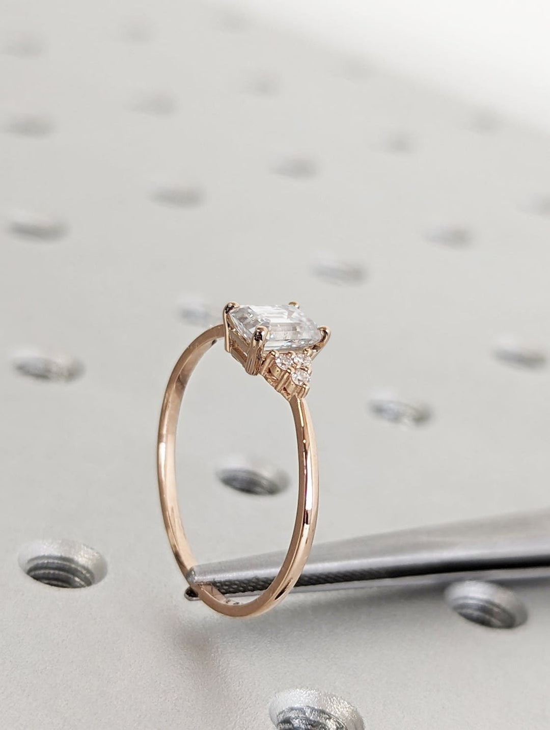 Shop the emerald cut cluster engagement ring collection online