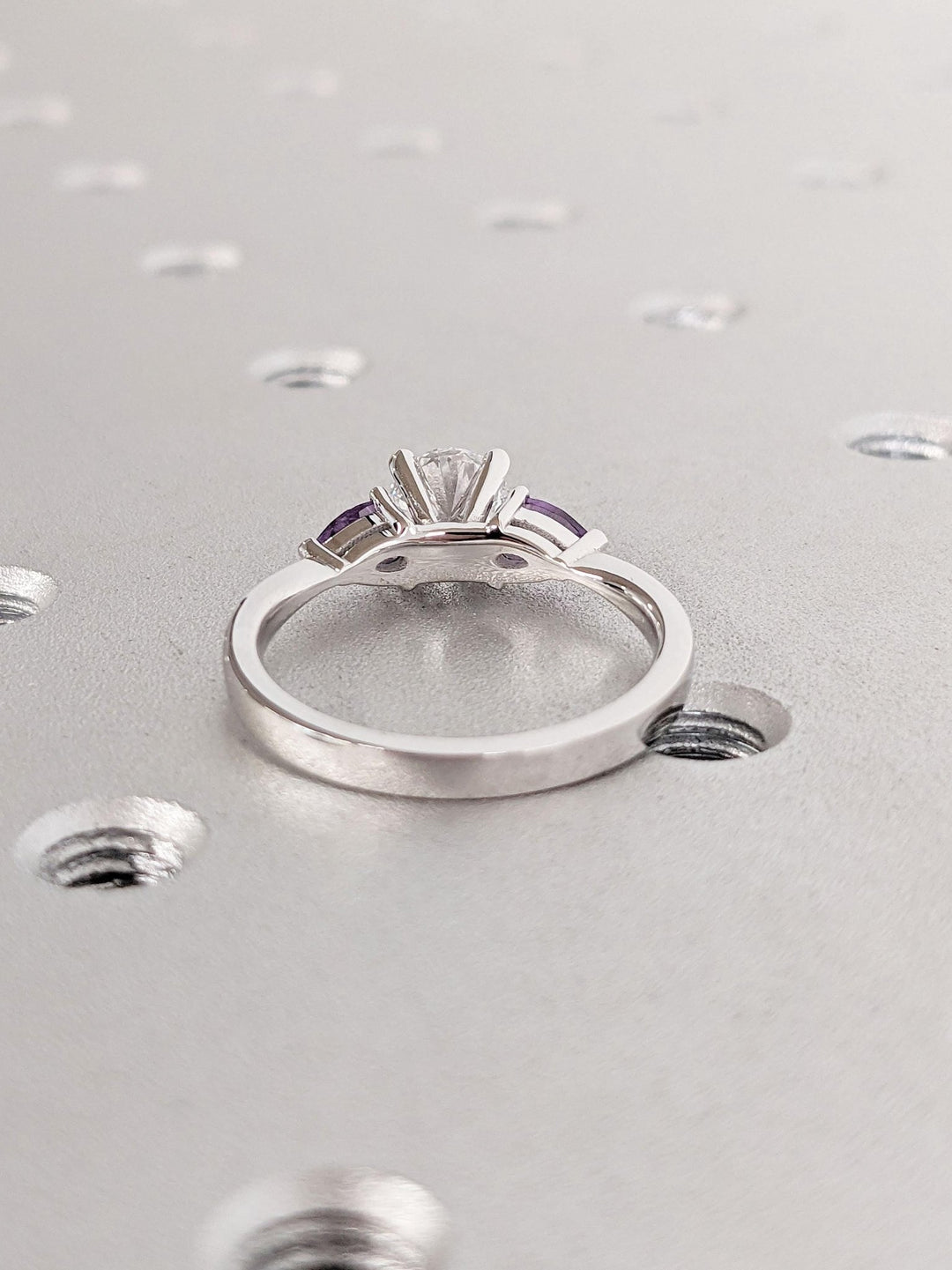 Round solitaire engagement ring finished in polished solid gold