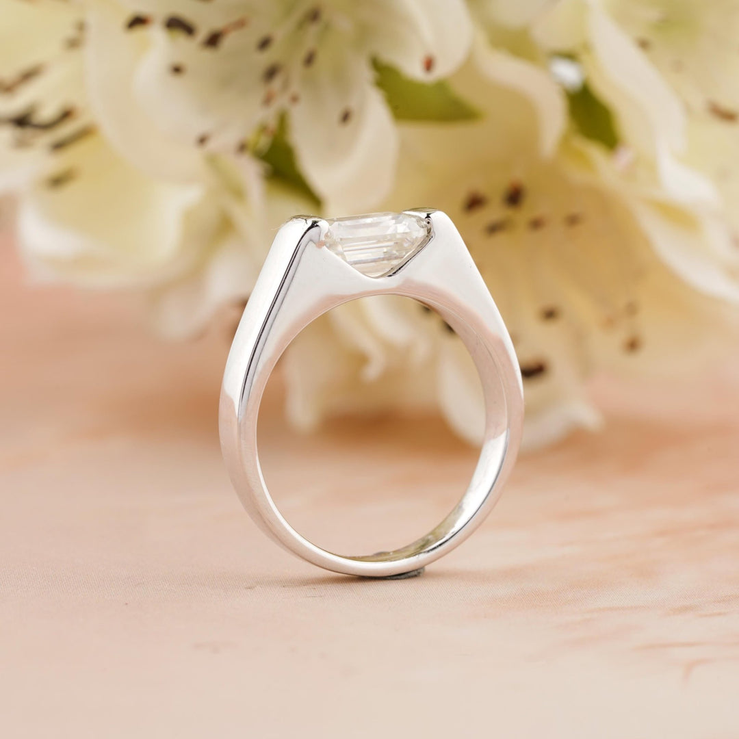 Handcrafted emerald cut east west lab grown diamond engagement ring