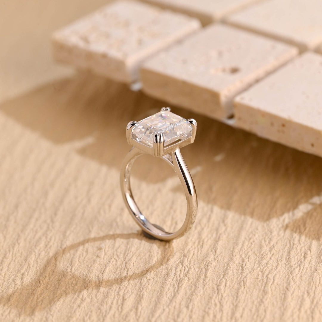 Top-down view of emerald cut solitaire engagement ring