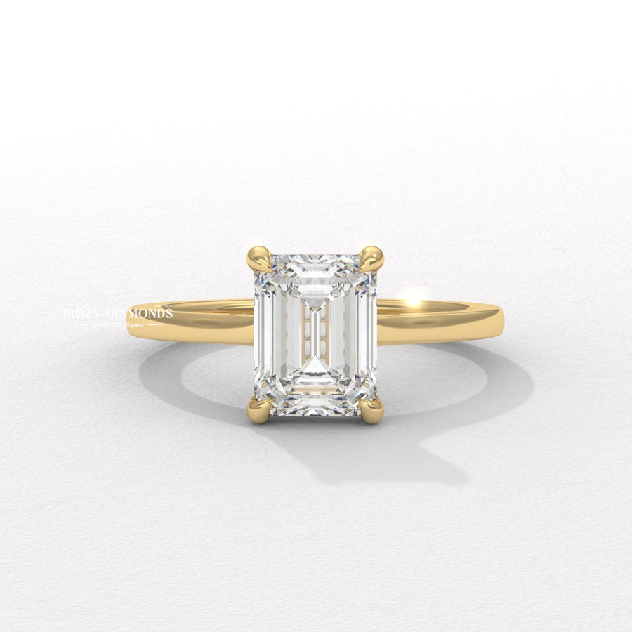 Emerald cut hidden halo engagement ring available to buy now