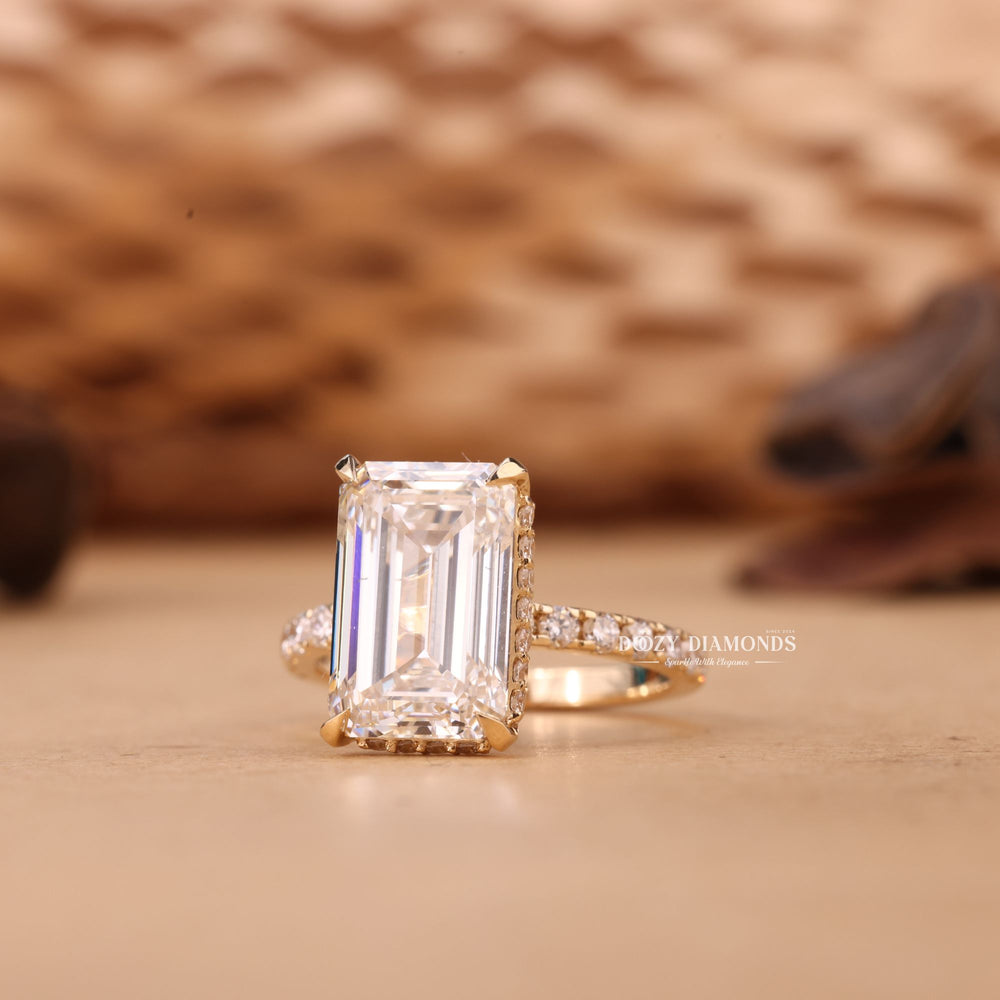 Emerald hidden halo diamond ring presented in signature gift packaging