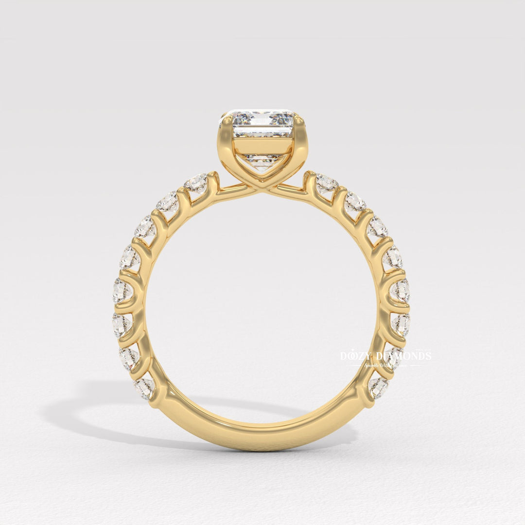 Emerald cut engagement ring side view showing band detail