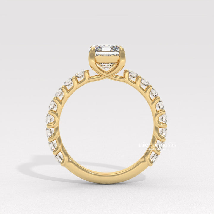 Emerald cut engagement ring side view showing band detail