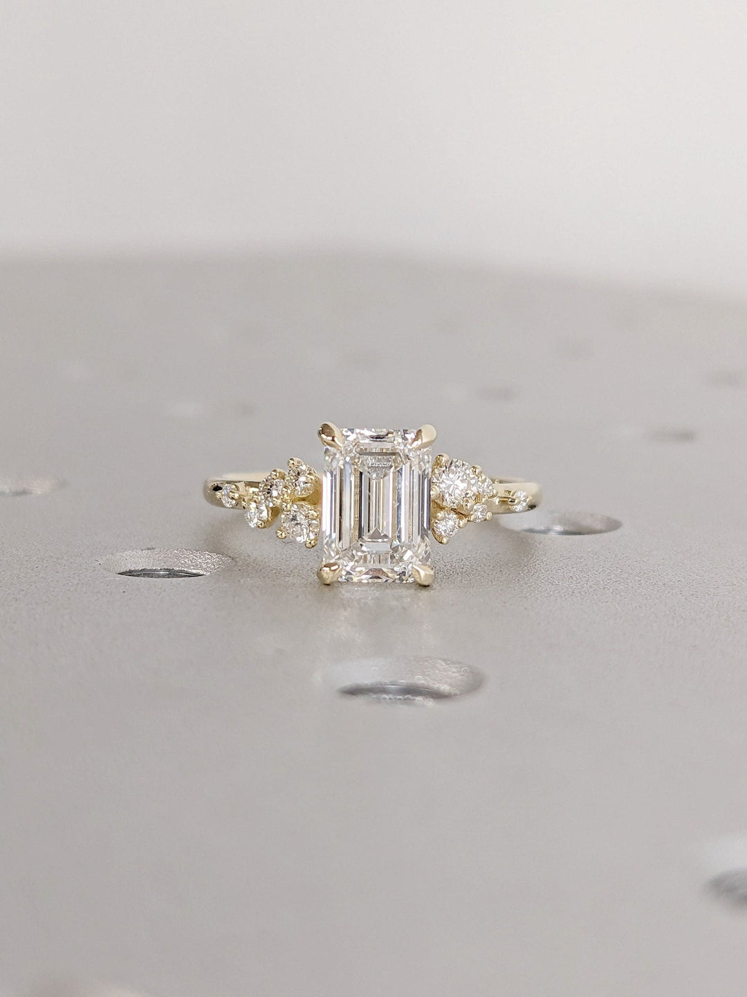 1.50CT emerald cut cluster engagement ring available to buy now