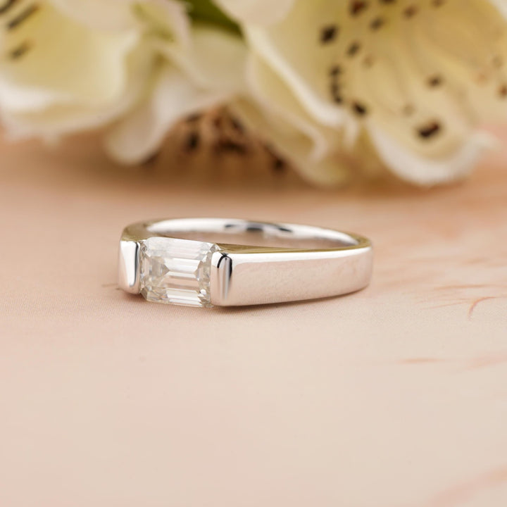 Premium emerald cut east west engagement ring crafted in solid gold