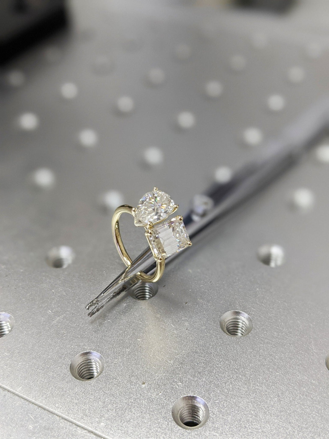 Profile view of pear cut solitaire engagement ring band