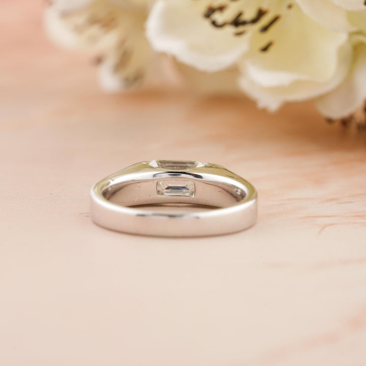 Classic emerald east west engagement ring crafted for everyday wear