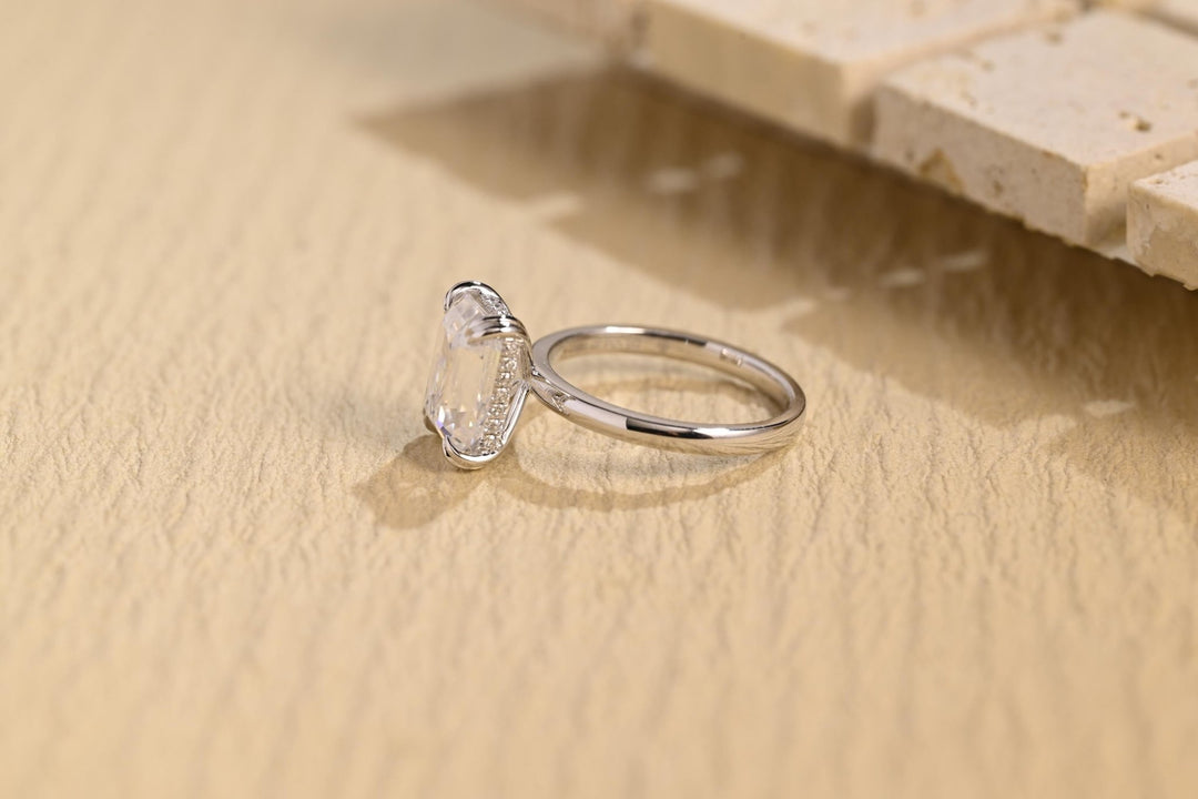 Shop the emerald cut hidden halo engagement ring collection online