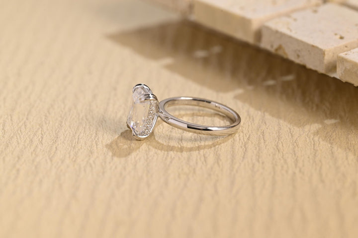 Shop the emerald cut hidden halo engagement ring collection online