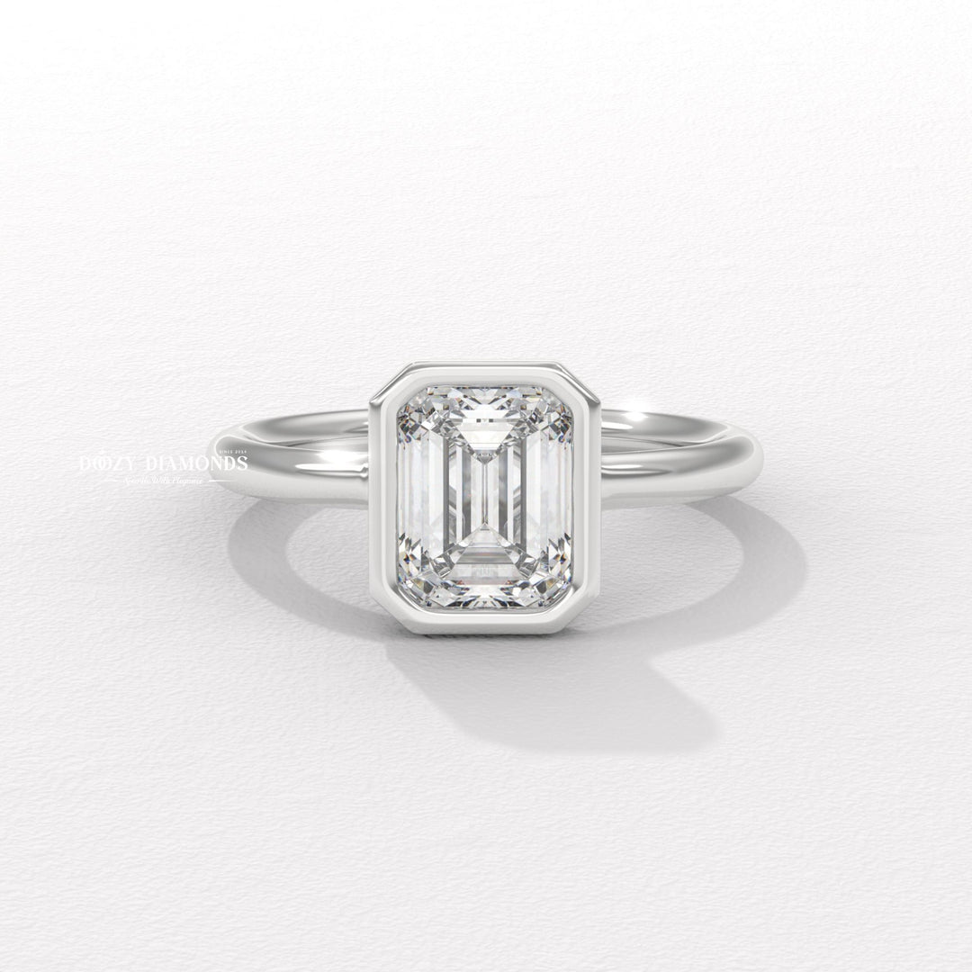 Emerald cut engagement ring side view showing band detail