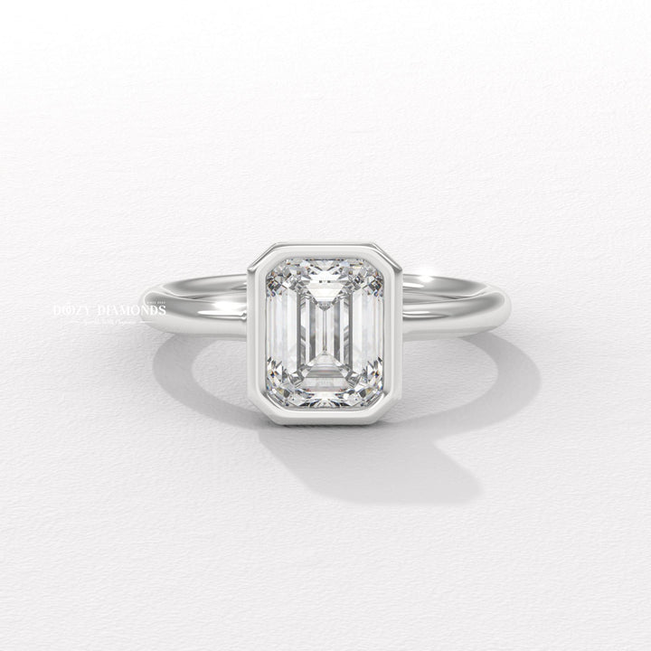 Emerald cut engagement ring side view showing band detail