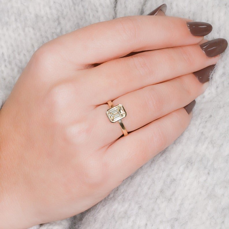 Emerald bezel lab grown diamond ring in jewelry gift box