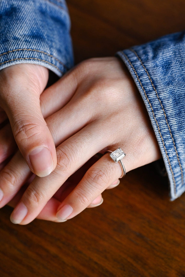 Premium emerald cut solitaire engagement ring crafted in solid gold