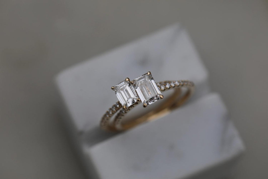 IGI certified emerald cut diamond in solitaire engagement ring setting