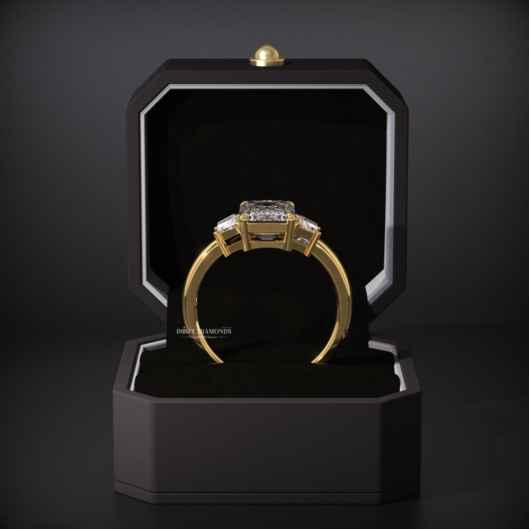 Emerald cut three stone engagement ring with IGI certified center diamond