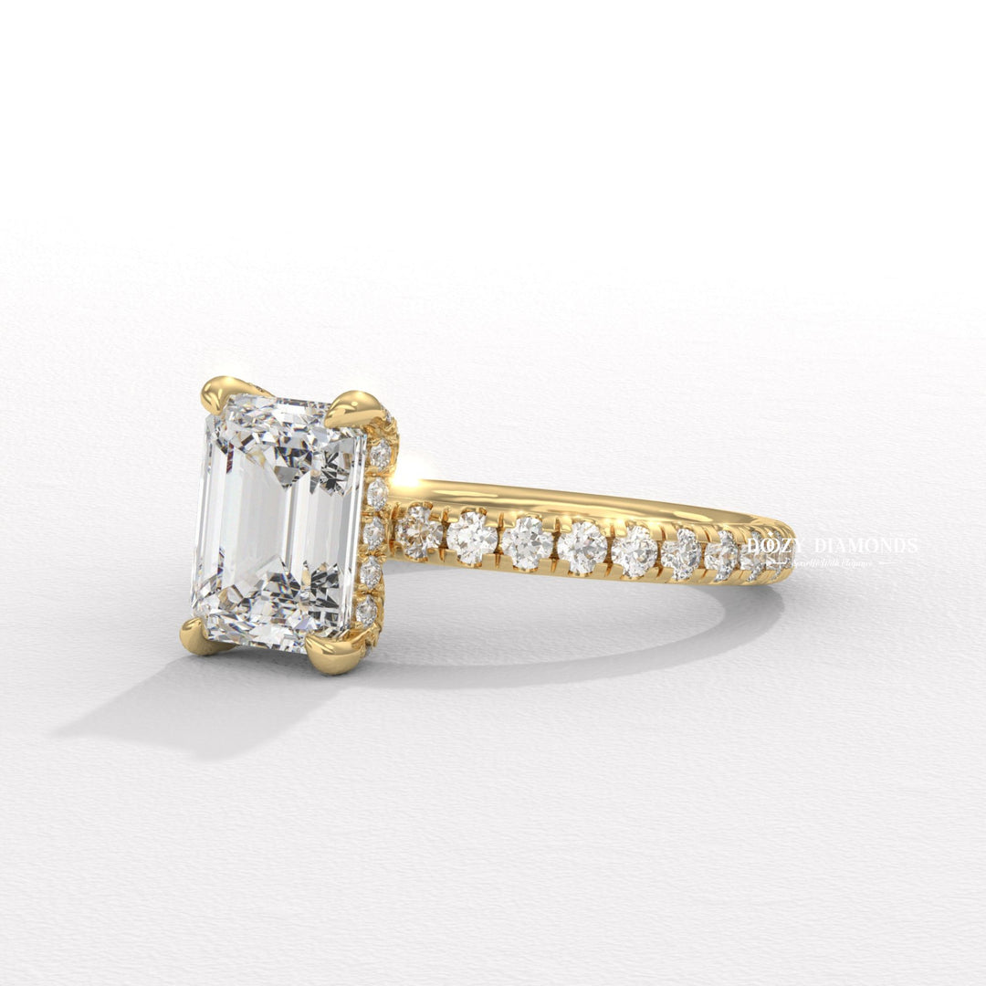Emerald hidden halo diamond ring presented in signature gift packaging