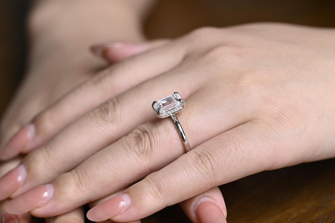 Emerald hidden halo engagement ring with IGI certificate and packaging