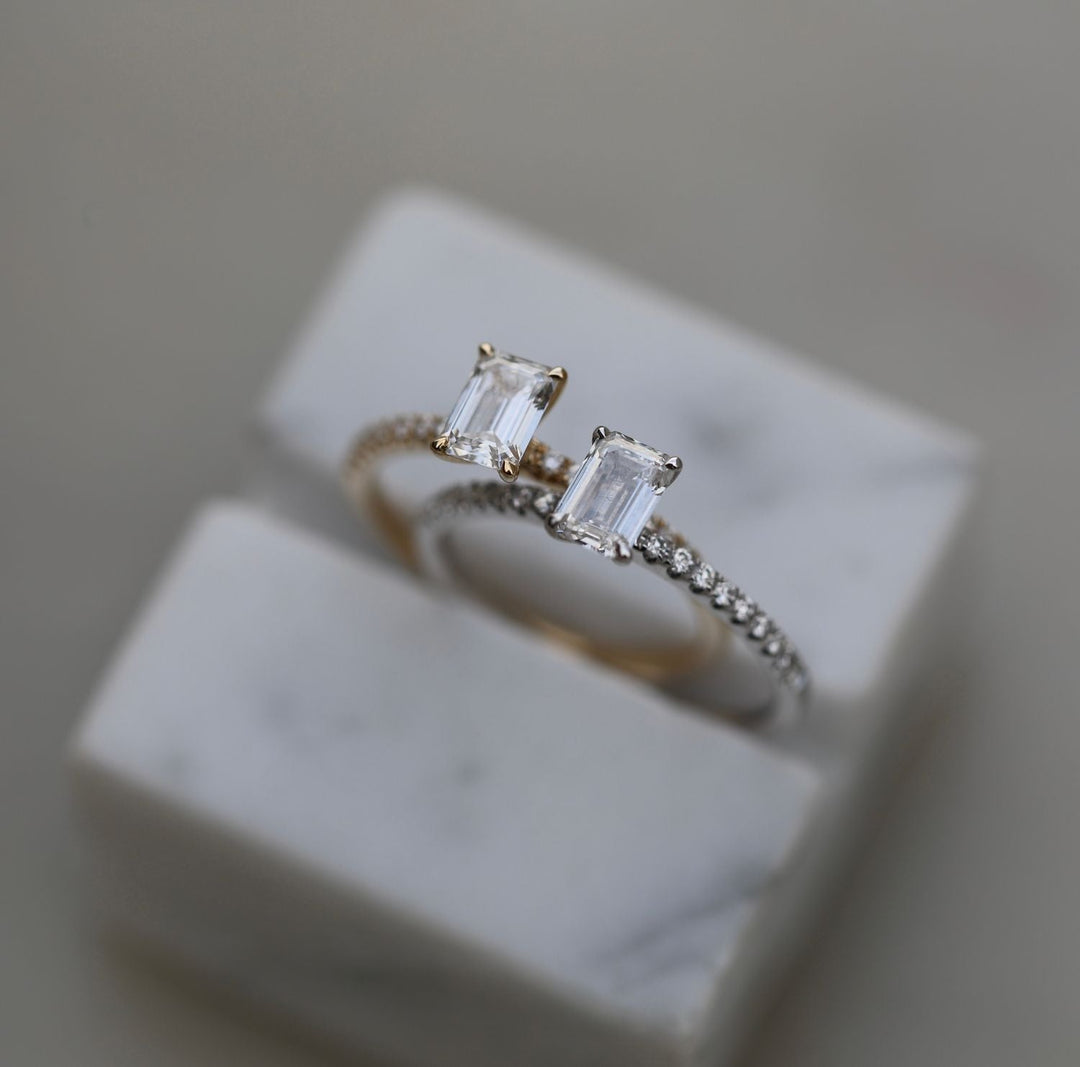 Emerald solitaire ring set with an IGI graded diamond