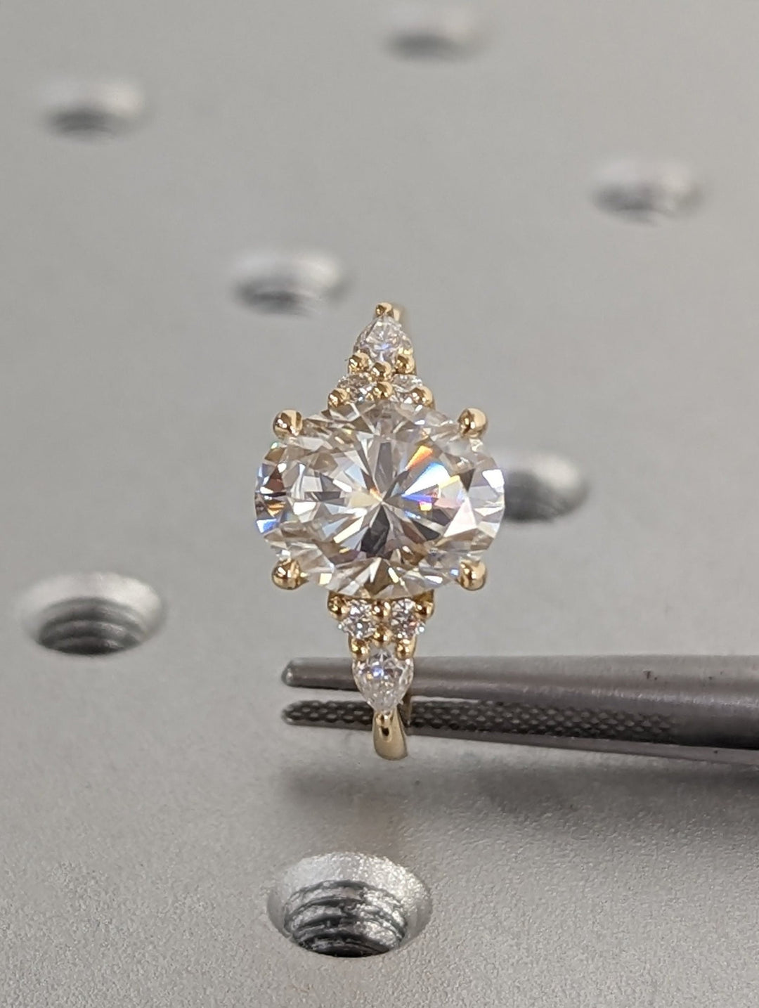 Oval cut diamond ring worn on hand