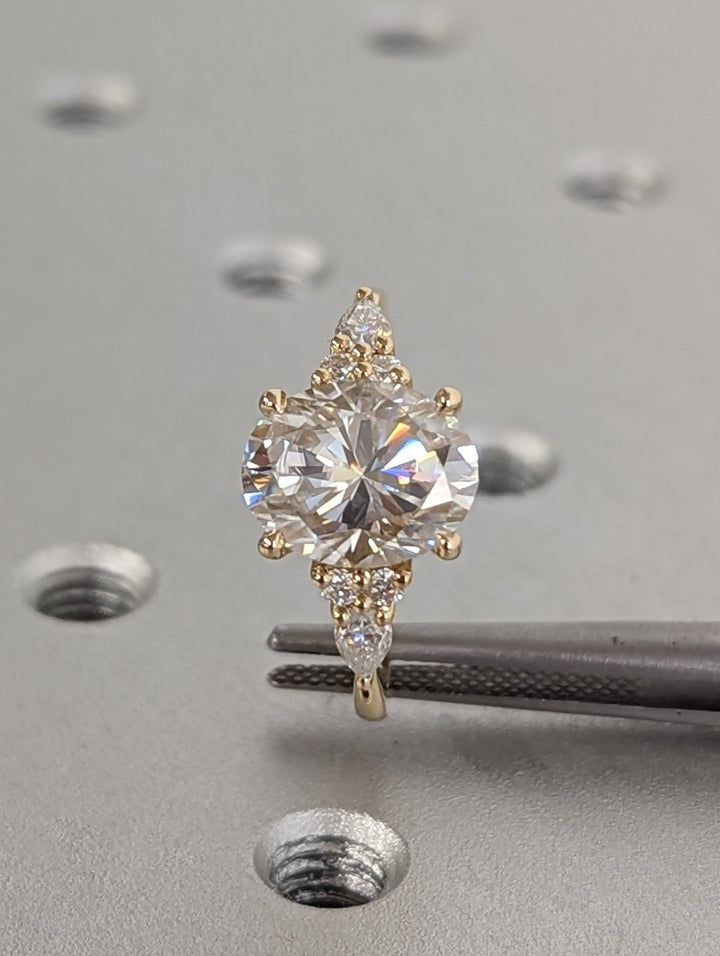 Oval cut diamond ring worn on hand
