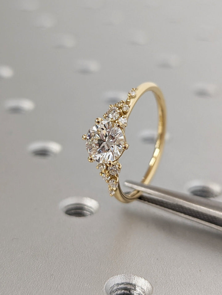 Classic round cluster engagement ring crafted for everyday wear