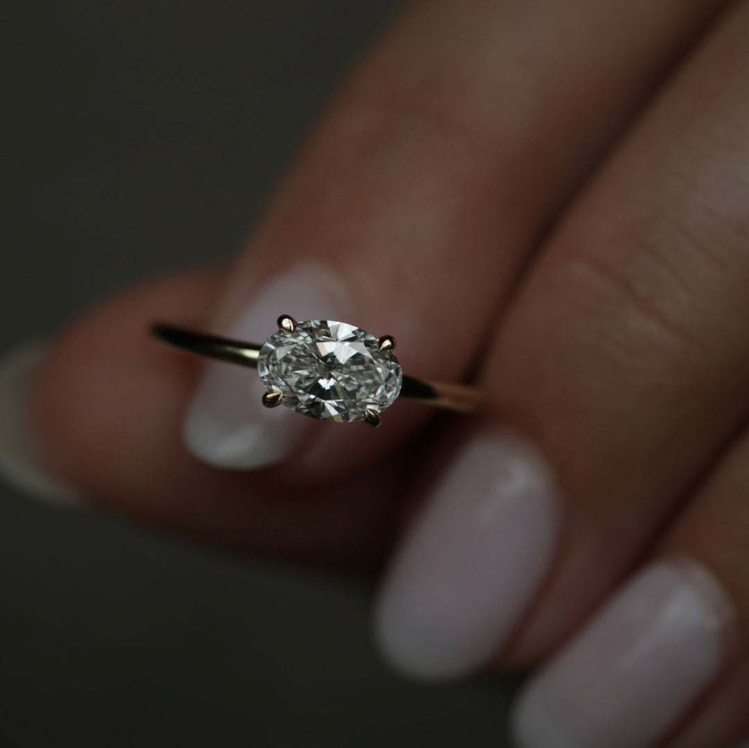 Oval cut engagement ring side view showing band detail