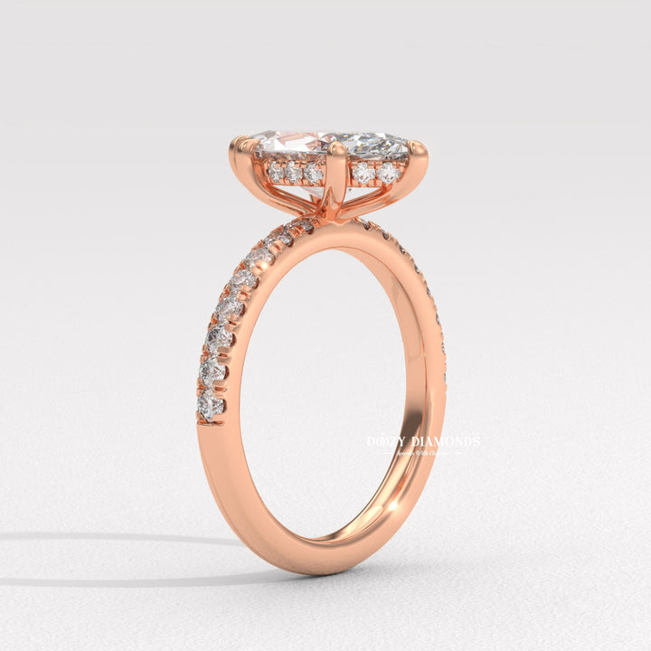Marquise pave engagement ring finished in polished solid gold