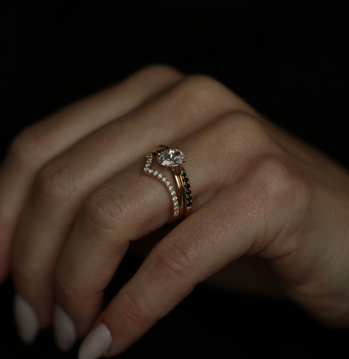 Profile view of oval cut solitaire engagement ring band