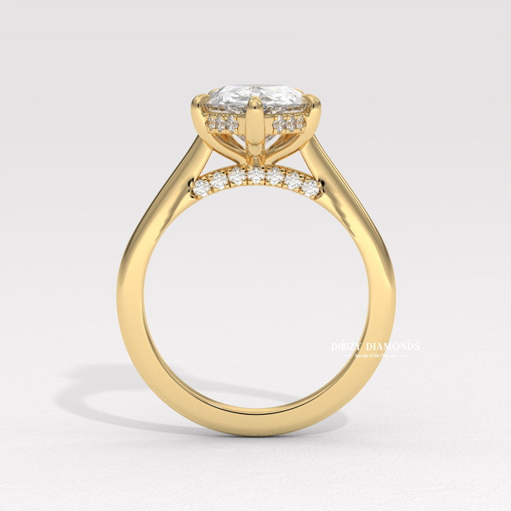Unboxing view of pear cut solitaire diamond engagement ring