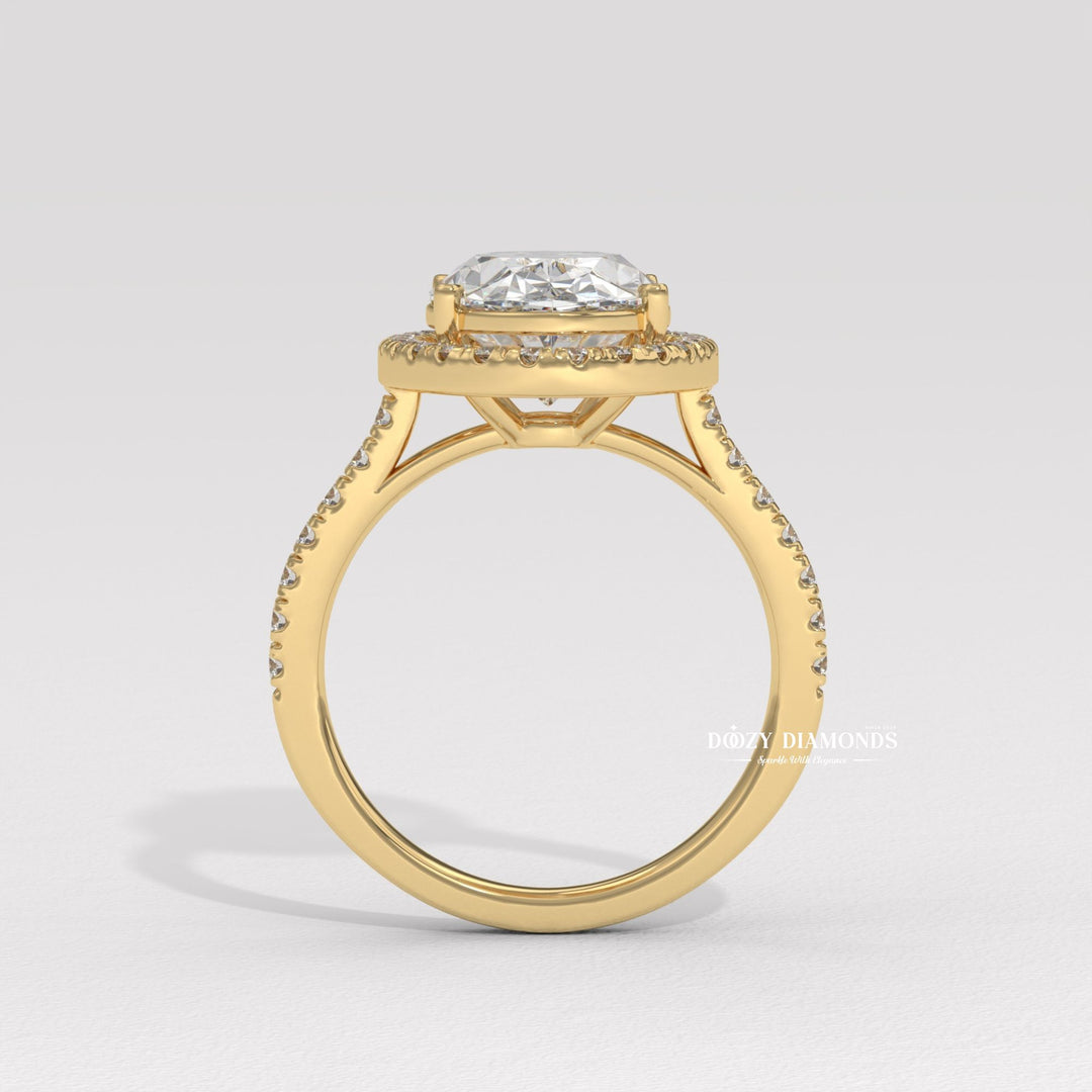 Lifestyle shot of oval halo diamond ring on hand